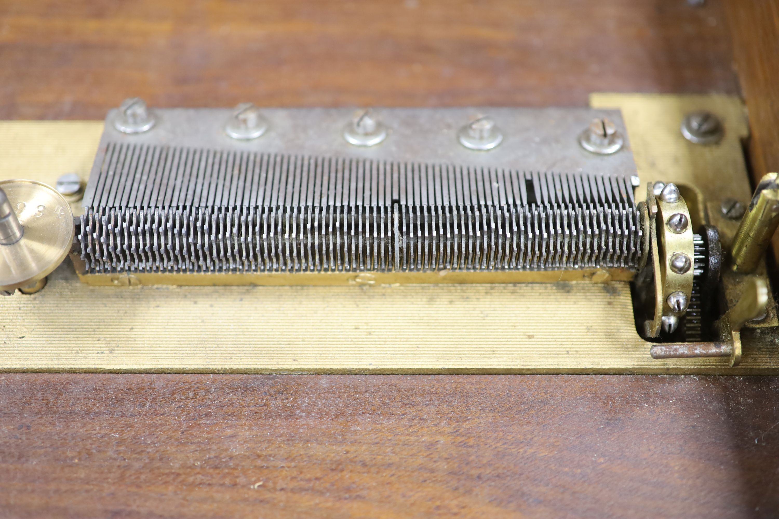 A large Polyphon walnut table top musical box, playing thirty 39.5cm discs